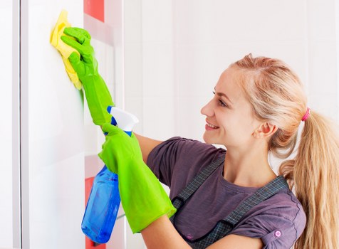 Commercial cleaning team maintaining a modern office lobby