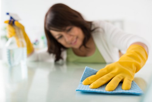 Cleaning hidden areas during a move in cleaning service